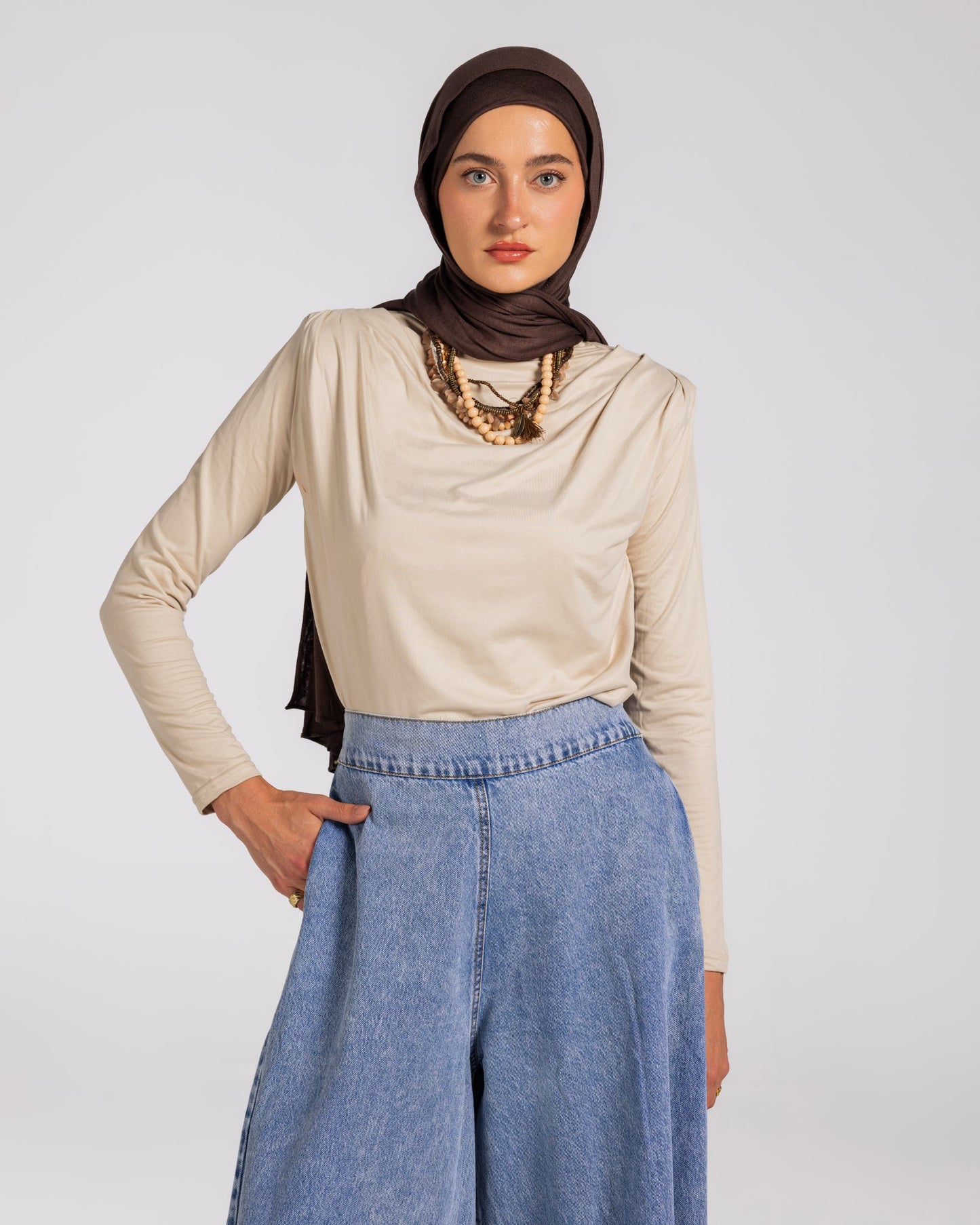 SHOULDER PADED DRAPED TOP - BEIGE