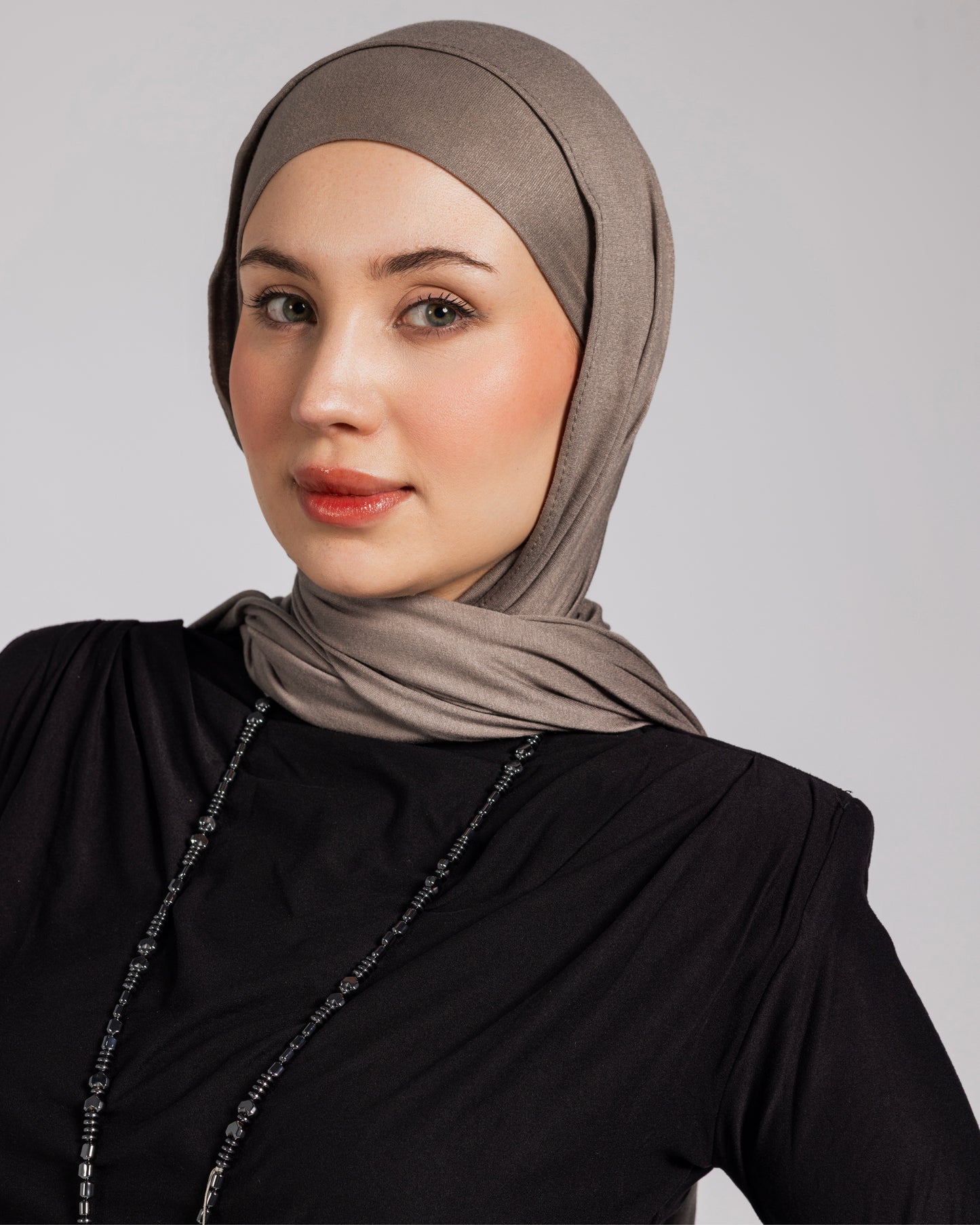 SHOULDER PADDED DRAPED TOP-BLACK